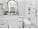 Bright, updated bathroom featuring a modern vanity and walk-in shower with storage niche at 921 Northeast Dr, Davidson, NC 28036