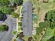 Aerial view showcases well-maintained townhome backyards, greenery, parking and surrounding landscape at 10078 Pergola View Ct, Charlotte, NC 28213