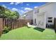 Backyard with artificial grass and privacy fence at 10078 Pergola View Ct, Charlotte, NC 28213