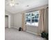 Bright bedroom with vaulted ceiling, large window, and a closet at 10078 Pergola View Ct, Charlotte, NC 28213