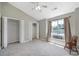 Spacious bedroom with vaulted ceiling, soft carpet, large window, and closet at 10078 Pergola View Ct, Charlotte, NC 28213