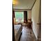 A bright bedroom featuring natural light and a desk for studying or working at 111 Crystal Creek Dr, China Grove, NC 28023