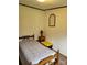 Cozy bedroom featuring a classic bed frame, side table, and neutral decor at 111 Crystal Creek Dr, China Grove, NC 28023