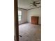 A cozy bedroom featuring neutral tones, carpeted floor, and a ceiling fan for added comfort at 111 Crystal Creek Dr, China Grove, NC 28023