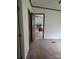 Hallway with a view of the living room with neutral paint, carpet and trim at 111 Crystal Creek Dr, China Grove, NC 28023