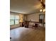 Inviting living room showcasing wood-look flooring and natural light from the window at 111 Crystal Creek Dr, China Grove, NC 28023