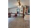 Open living space featuring wood-look floors and a ceiling fan at 111 Crystal Creek Dr, China Grove, NC 28023