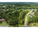 Aerial view of a home and property with mature trees and landscaping at 1115 Sides Rd, Salisbury, NC 28146