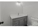 Bathroom featuring modern vanity sink and toilet at 1115 Sides Rd, Salisbury, NC 28146