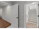 Hallway with stairway and hardwood floors at 1115 Sides Rd, Salisbury, NC 28146