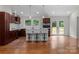 Open kitchen with bar seating featuring stainless appliances, shaker cabinets and access to patio at 1115 Sides Rd, Salisbury, NC 28146