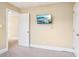 Another bedroom view, showing a mounted TV and doorway at 116 Scottie Ct, Rock Hill, SC 29730