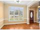 Dining room with hardwood floors, large windows and classic trim at 116 Scottie Ct, Rock Hill, SC 29730