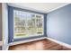 Bright living room features large windows and classic trim details at 116 Scottie Ct, Rock Hill, SC 29730