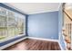 Bright living room features large windows, hardwood floors, and classic trim details at 116 Scottie Ct, Rock Hill, SC 29730