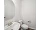 Clean half bathroom featuring a pedestal sink, and neutral walls at 1207 Laggan Ln, Indian Trail, NC 28079