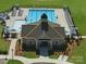 Overhead view shows a community pool area with lounge chairs and tables for residents to enjoy on a sunny day at 1207 Laggan Ln, Indian Trail, NC 28079