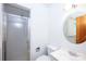 A neutral-toned bathroom with updated fixtures, a vanity, and a shower at 1216 Manchester Ln, Charlotte, NC 28227