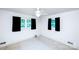 A bedroom featuring an abundance of natural light and a neutral color palette at 1216 Manchester Ln, Charlotte, NC 28227