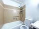 Well-maintained bathroom with tiled walls, grab bars, and accessible features ensuring safety and convenience at 1227 Flowe Dr, Matthews, NC 28104