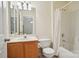 Bathroom features vanity, toilet, shower with curtain and ceiling light at 12342 Swan Wings Pl, Huntersville, NC 28078