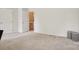 Bedroom features neutral carpet, natural light and access to adjacent room at 12342 Swan Wings Pl, Huntersville, NC 28078