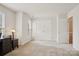 Bedroom features neutral carpet, natural light, closet and ceiling light fixture at 12342 Swan Wings Pl, Huntersville, NC 28078