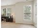 Versatile bonus room featuring natural light from the windows, carpeting, and ample space at 12342 Swan Wings Pl, Huntersville, NC 28078