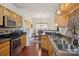 Well-equipped kitchen with stainless steel appliances and an open layout to the dining area at 12342 Swan Wings Pl, Huntersville, NC 28078