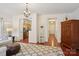 Open living room featuring hardwood floors, an area rug, and open view to the kitchen at 12342 Swan Wings Pl, Huntersville, NC 28078