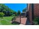 Relaxing backyard deck and beautifully maintained lawn provides ideal outdoor space at 1240 Fawn Ridge Nw Rd, Concord, NC 28027