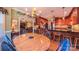 Open floor plan showcases the dining area, with a round table and chairs, seamlessly connecting to the kitchen at 1240 Fawn Ridge Nw Rd, Concord, NC 28027