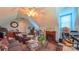 Cozy living area with seating, fireplace, bar and games at 1240 Fawn Ridge Nw Rd, Concord, NC 28027