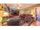 Inviting living room with a fireplace, plush seating, and elegant decor, creating a cozy atmosphere at 1240 Fawn Ridge Nw Rd, Concord, NC 28027
