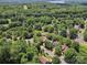 A beautiful aerial view of the home nestled in a lush, green, wooded neighborhood at 1252 Winding Path Rd, Lake Wylie, SC 29710