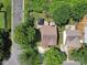 This aerial view captures the home's backyard with an outdoor living space, including grill and outdoor seating at 1252 Winding Path Rd, Lake Wylie, SC 29710