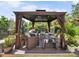 Cozy backyard gazebo with comfortable seating and shade, perfect for outdoor relaxation at 1252 Winding Path Rd, Lake Wylie, SC 29710