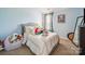 Neutral bedroom featuring a comfy queen bed, natural light, and ample space for relaxation at 1252 Winding Path Rd, Lake Wylie, SC 29710