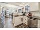 Updated kitchen with island, stainless steel appliances, granite countertops and wood-look tile flooring at 1252 Winding Path Rd, Lake Wylie, SC 29710