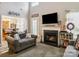 Cozy living room with fireplace, large-screen TV, and comfortable seating arrangement at 1252 Winding Path Rd, Lake Wylie, SC 29710