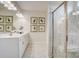 Elegant bathroom with dual vanity, marble floors, and a glass-enclosed shower at 1254 Langston Ln, Salisbury, NC 28144