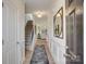 Inviting entryway featuring hardwood floors, staircase, and a decorative mirror at 1254 Langston Ln, Salisbury, NC 28144