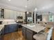This kitchen features an island with seating and stainless steel appliances at 1325 Kennon St, Charlotte, NC 28205