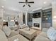 Open-concept living room with fireplace and view to kitchen area at 1325 Kennon St, Charlotte, NC 28205