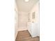 Bathroom featuring a tiled shower with sleek fixtures and vanity with storage at 1406 Caldwell St, Gastonia, NC 28052
