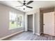 Bedroom with a large closet and a bright window at 142 Single Oak Dr, Troutman, NC 28166