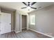 Bedroom with a large closet and a bright window at 142 Single Oak Dr, Troutman, NC 28166
