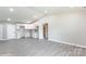 Open space showcasing a kitchen with bright white cabinetry and ample space at 142 Single Oak Dr, Troutman, NC 28166