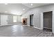 Spacious living room showcasing a brick fireplace and neutral tones at 142 Single Oak Dr, Troutman, NC 28166