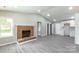 Open living room with fireplace, bright paint, with modern flooring at 142 Single Oak Dr, Troutman, NC 28166